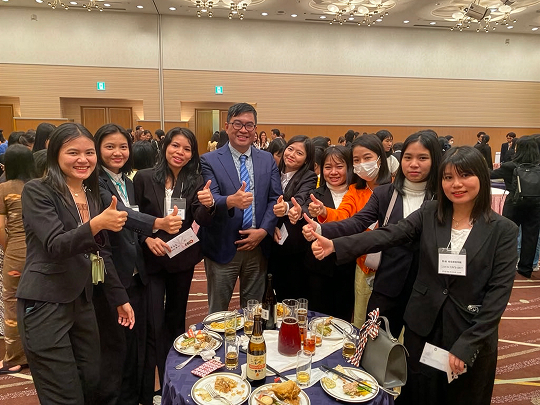 At a reunion gathering with former students working in Japan