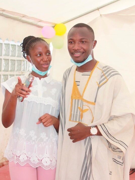 Emmanuel wearing a traditional outfit called "Faso Dan Fani"