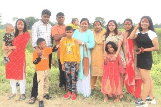 A ritual where elders apply Tika to the foreheads of younger family members